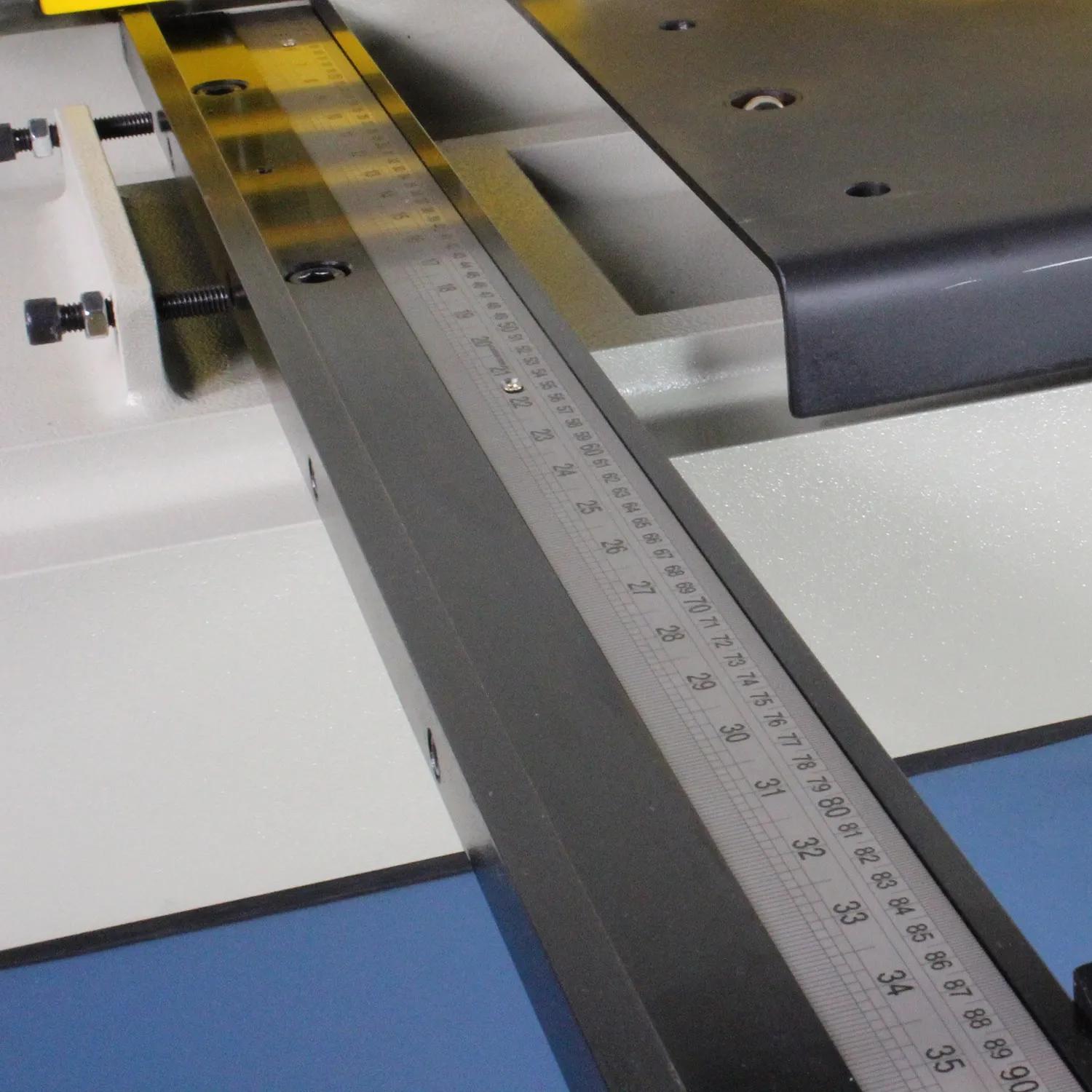 Squaring Arm keeps the material perpendicular to the blade