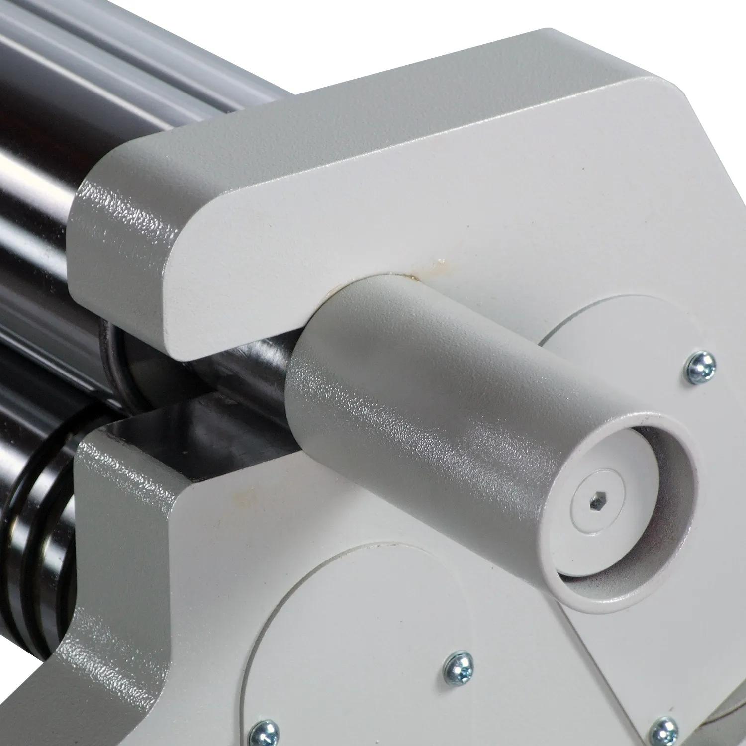 The top roller can pivot out to remove rolled material