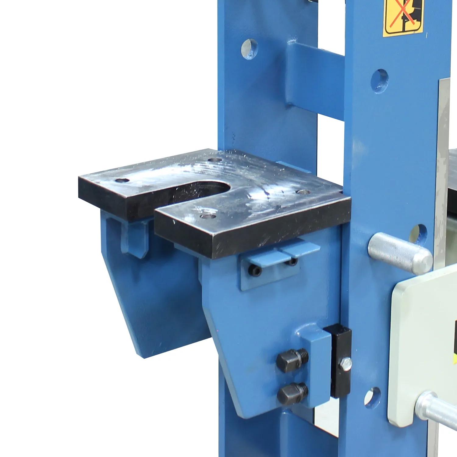 Side Work Table: A movable table to raise or lower to support the material to be pressed.